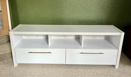 White TV console with brass handles