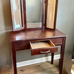 Vintage small, solid wood vanity table with a tri-fold mirror