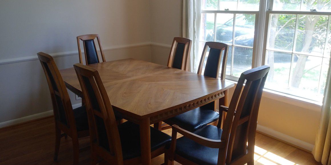 Gorgeous wooden mid century dining room table and chairs