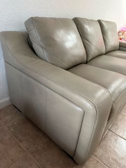Taupe Leather sleeper sofa