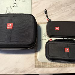 Big traveling carry case for Nintendo switch OLED and 3 smaller cases for Nintendo switch OLED