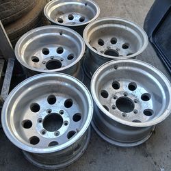 MUST GO !! SET OF 5 WHEELS!! 15X10 ALUMINUM WHEELS!! 850$ OBO