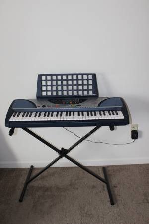 Yamaha keyboard with stand