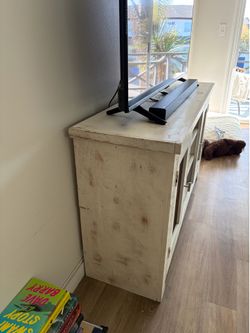 White distressed tv stand