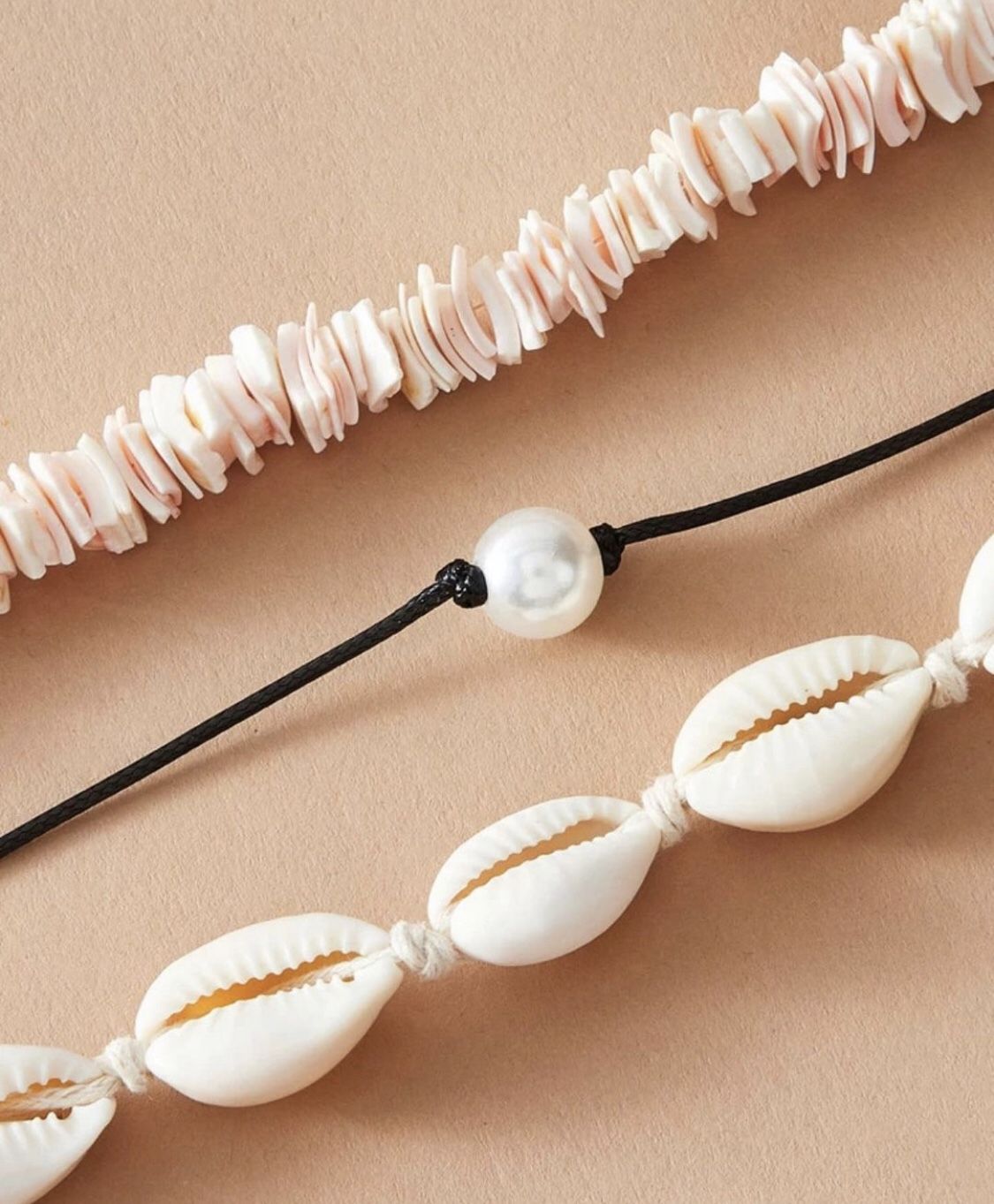 jewelry set : shell necklace, pearl bead, and another shell necklace