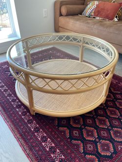 Glass top rattan coffee table