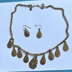 Gold tone necklace and earring set