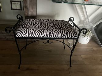 Wrought Iron Bench with Zebra Print Cushion
