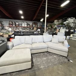 Costco light grey sectional sofa with Ottoman
