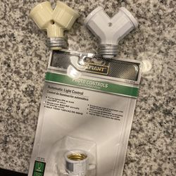 Defiant autmatic light control and two light bulb adaptor