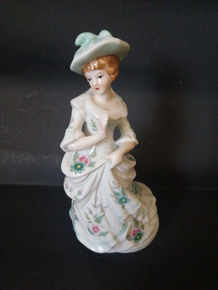 Vintage Porcelain Victorian Lady Figurine in Flowered Dress Music Box (8.5" tall)
*Music box works*