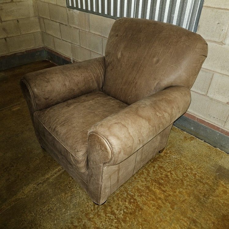 Brown Leather Chair + Ottoman