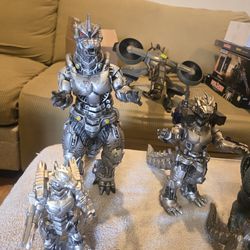 Mecha Godzilla and smaller Godzillas vynil figures
