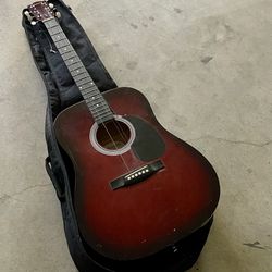 Guitar and Case. 