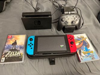 Nintendo Switch version 2 with Breath of the Wild , Pokemon Sword and Pro Controller