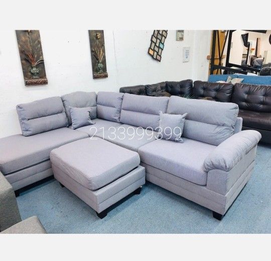 Gray Reversible Sectional Sofa With Ottoman New