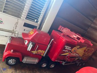 Lightning MCQueen car with built in racetrack