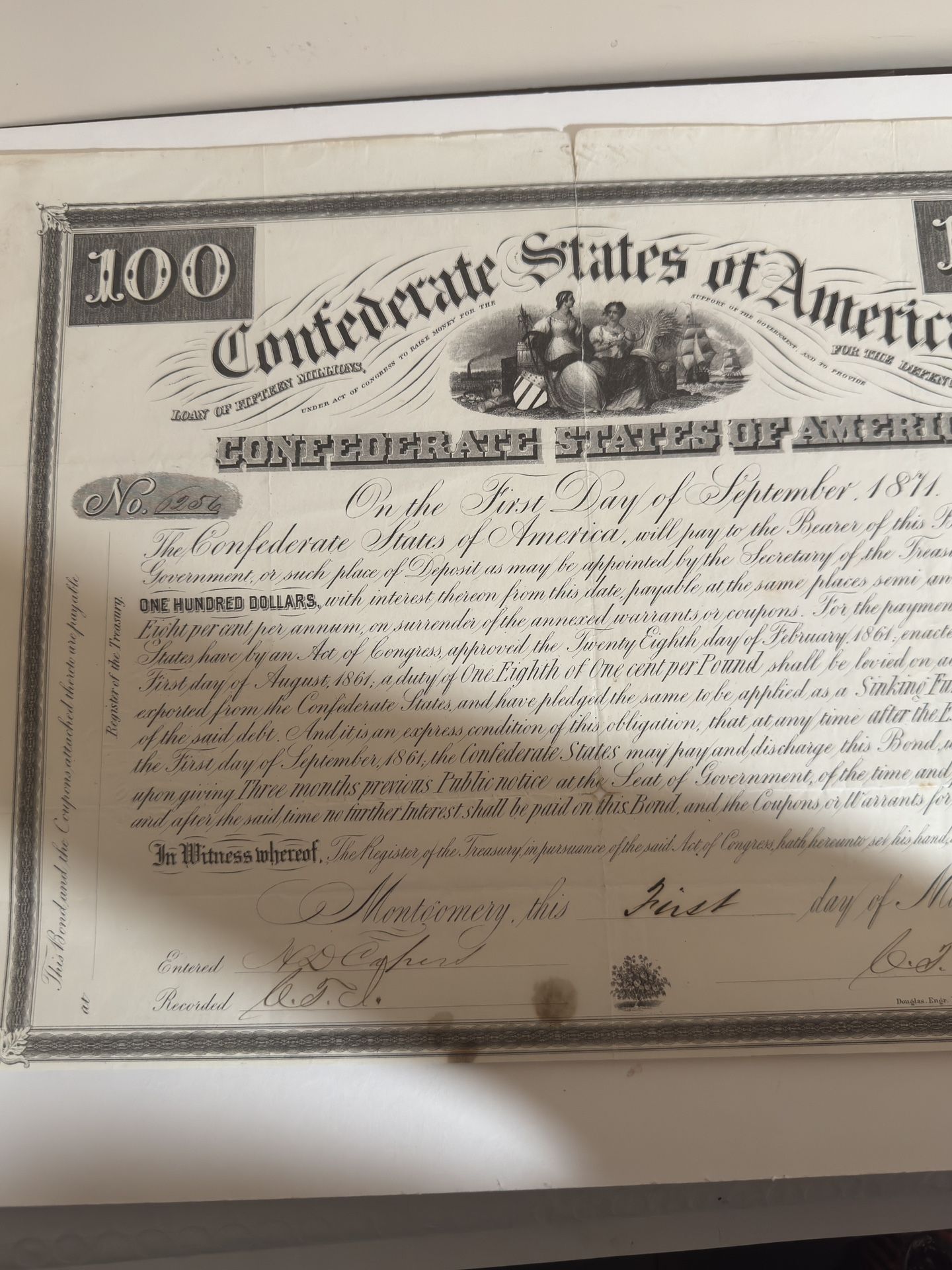 This is a Confederate States of America $100 bond issued in 1861.