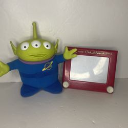 Toy story alien and etch a sketch toys