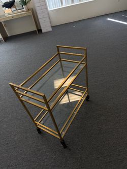 Rolling glass cart
