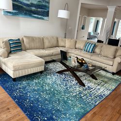 Haverty’s 4 piece sectional + glass coffee table and end table