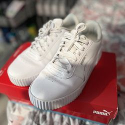 White Woman Pumas (size 8.5)