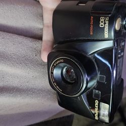 Olympus Superzoom 800 35mm film camera. 