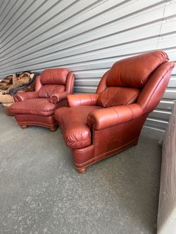 Hancock and Moore leather terracotta chairs