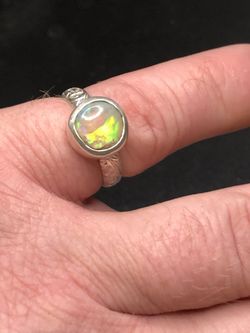 8927 Australian Crystal Opal ring from Lighting Ridge. Opal is 3.2ct 10x10x6mm Green and Blue broad flashes. Size USA 8