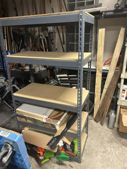 Garage shelving storage five shelves, metal and wood can be taken apart to fit into car