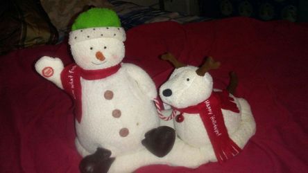 Singing and dancing snowman and pal