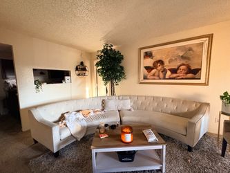 Rounded white couch