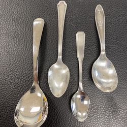 4 small spoons, Sheffield, Oneida, Avon. Sized from 3 7/8” to 4.75”