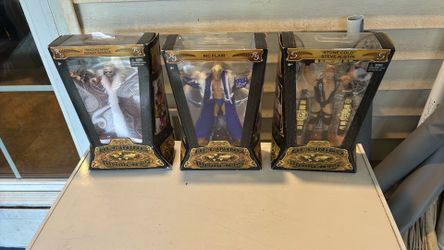 WWE COLLECTIBLES DEFINING MOMENTS FIGURES