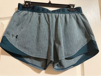 Under Armour women’s size medium shorts, marbled hunter green with hunter green accents.