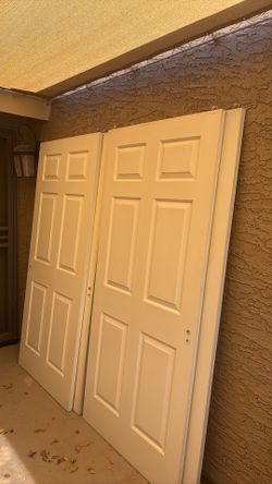Free. 2 sets of sliding closet doors.