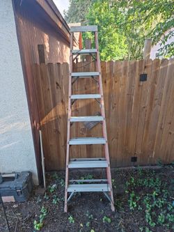 Fiberglass Step Ladder 8 ft/wooden ladder also.