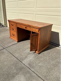 Executive desk with shelves.