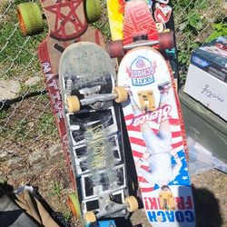 Multiple Long Boards And Skateboards 