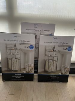 3 unopened bathroom towers with hampers