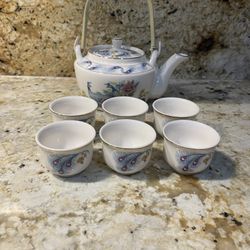 7pc Vintage Haeng Nam Snow Bone China tea set with a peacock design.