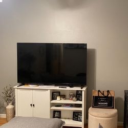 White TV Console With Shelves And Cabinet