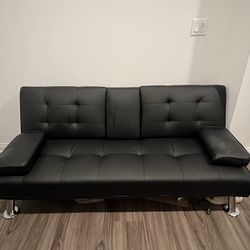 LEATHER FUTON PERFECT FOR DEN OR OFFICE SPACE
