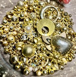 Vintage gold, beads, and trinkets.