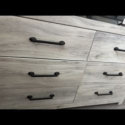 Wood dresser with a mirror