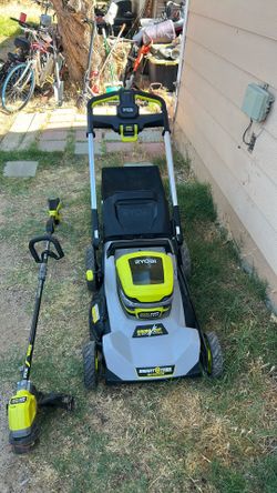 Land mower and weed eater plus charger  Ryobi 40v mower is self propelled 6ha battery and battery included excellent condition