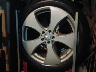 HAVE A SET OF 4 "20" RIMS AND TIRES