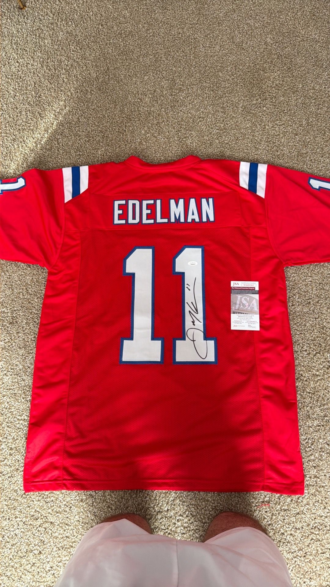 Signed patriot Julian Edelman jersey with COA sticker and card