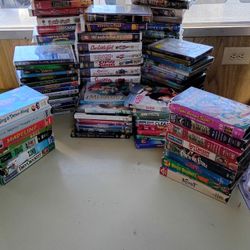 DVDs And VHS Some Brand New. Movies