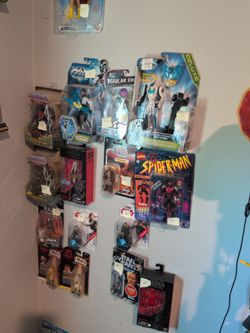 Various action figures and collectibles